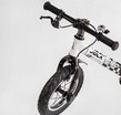 Велобіг 12 Corso надувні колеса, сталева рама «SKIP JACK» 11057 ручне гальмо, з амортизатором, чорно-білий