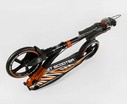 Самокат дитячий 2-х колісний, PU Best Scooter 79740 чорно-помаранчевий, колеса Ø230-200mm, AL, 1 амортизатор передній, ФАРА, затискач керма фото westvelo.com