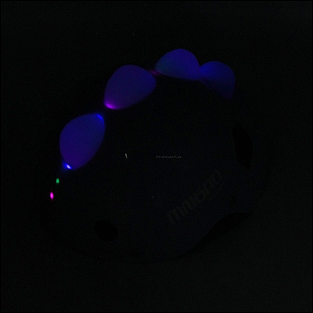 Вело шолом дитячий 587 "Динозавр" фіолетовий, з мигалкою, нерегульований фото westvelo.com