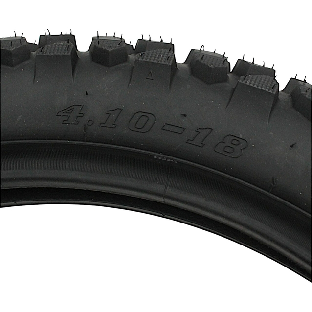 Покришка "18" 4.10-18 TRAZANO (871) шип-кросс TT фото westvelo.com