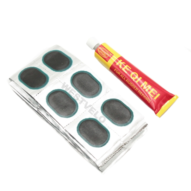 Латки + клей RS 48 овальні (чорні) KEQIMEI фото westvelo.com