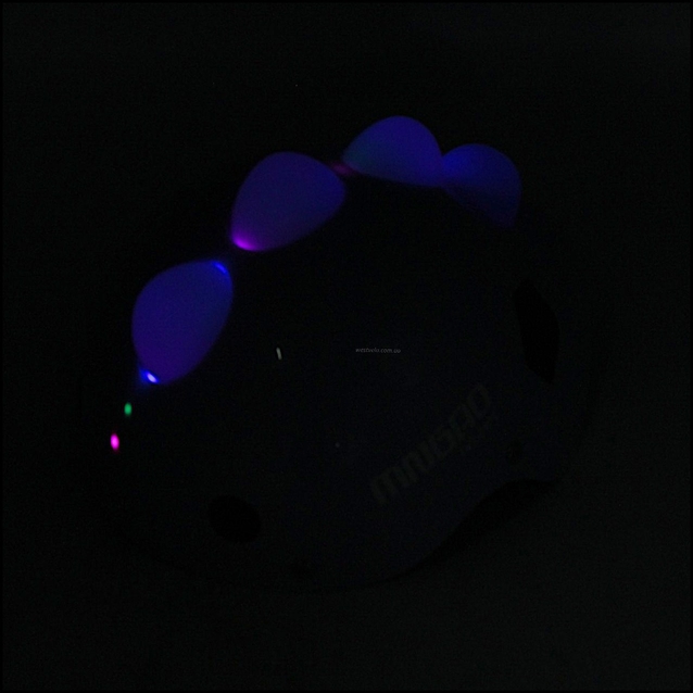 Вело шолом дитячий 587 "Динозавр" персиковий, з мигалкою, нерегульований фото westvelo.com